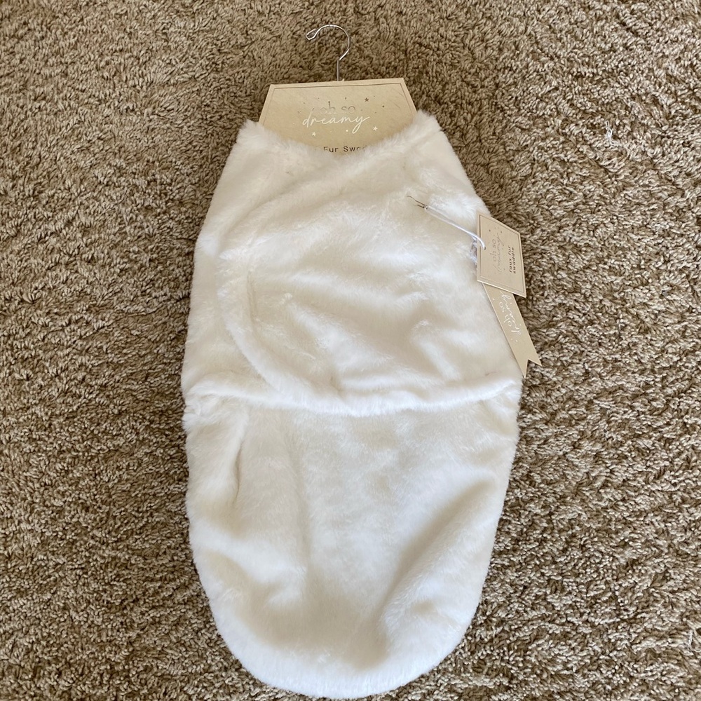 Fuzzy white baby swaddle 0-3mo